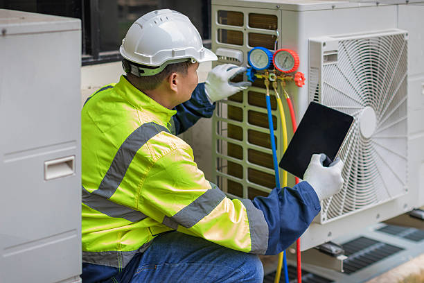Professional Air Duct Cleaning technician working in Belmont, MA